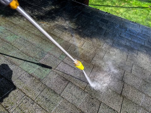 Pressure washing roof